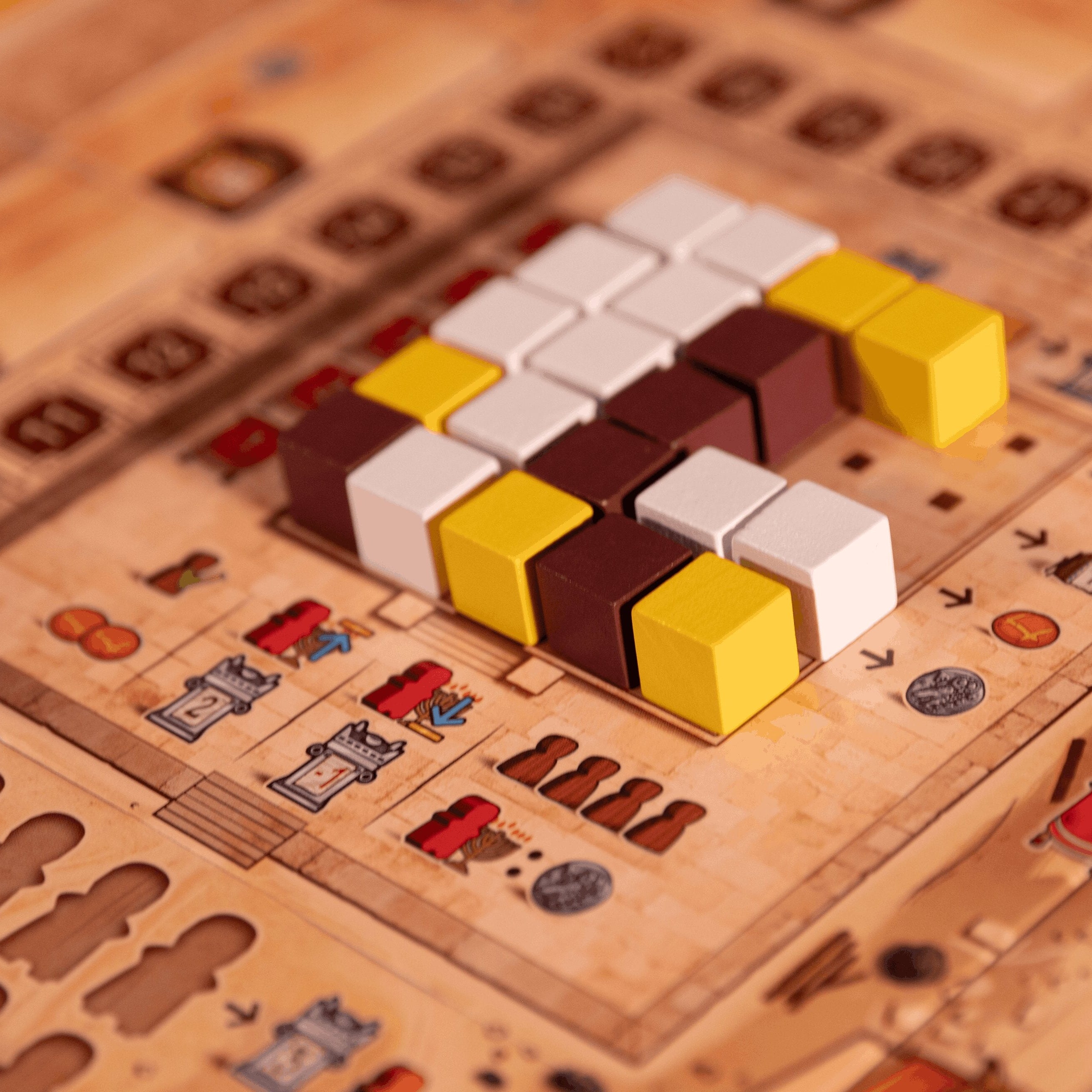 Close-up of a Ludo board game with dice showing various colors.