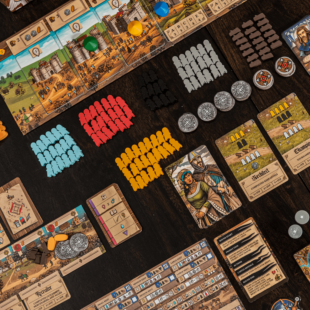 Board game with various cards, tokens, and pieces on a dark surface